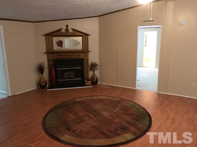 4032 Holder Road Durham, NC 27703 - Photo 5 of 13 Spacious with wood burning fireplace!