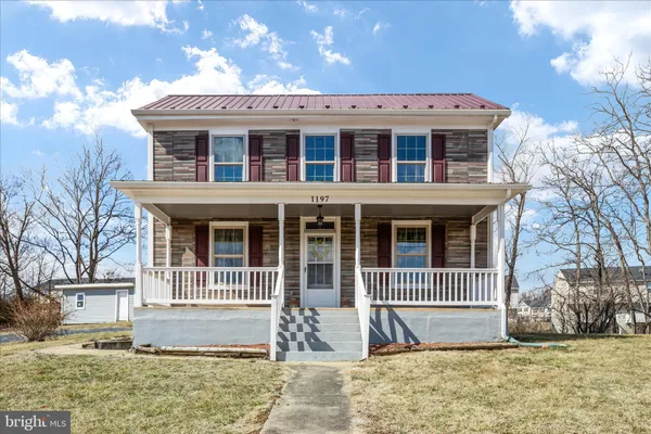 a bathroom with a tub a sink and a shower