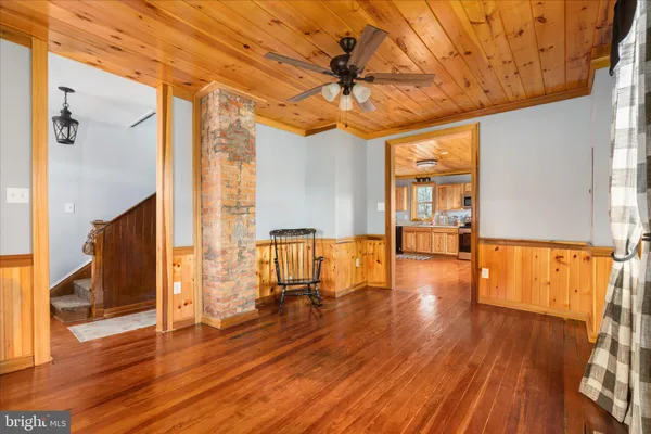 a kitchen with stainless steel appliances granite countertop a refrigerator stove and sink