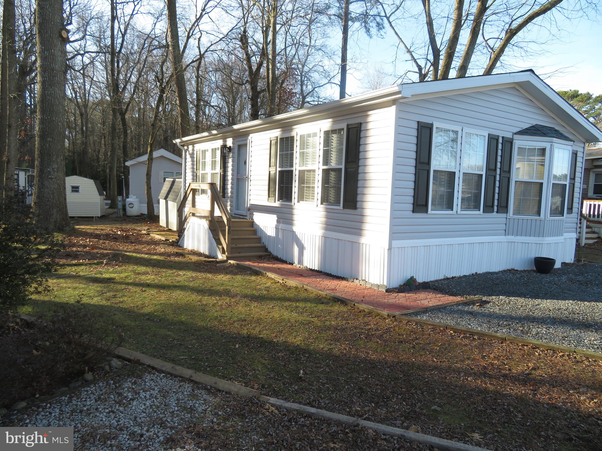 120 Skipjack Circle Berlin, MD 21811 - Photo 1 of 91 a front view of a house with a yard