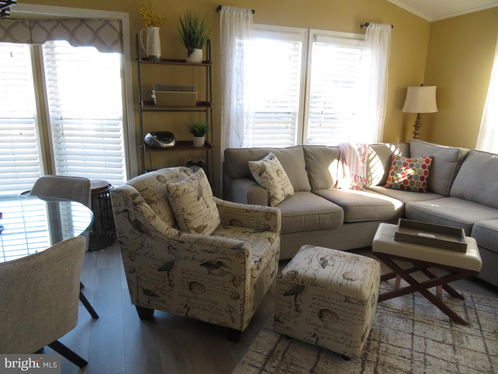 120 Skipjack Circle Berlin, MD 21811 - Photo 12 of 91 a living room with furniture and a window