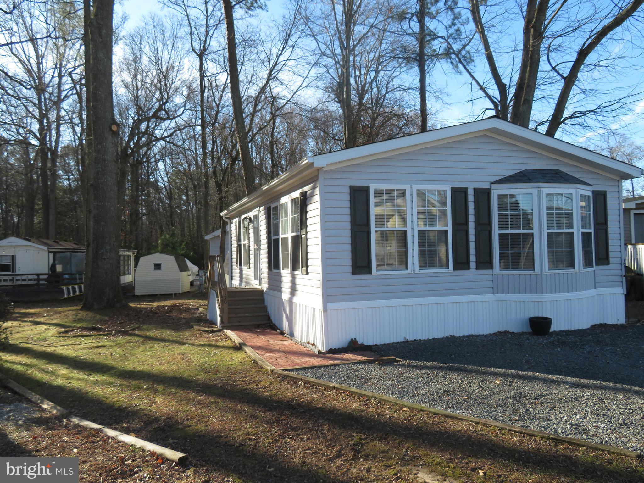 120 Skipjack Circle Berlin, MD 21811 - Photo 2 of 91 a front view of a house with a yard