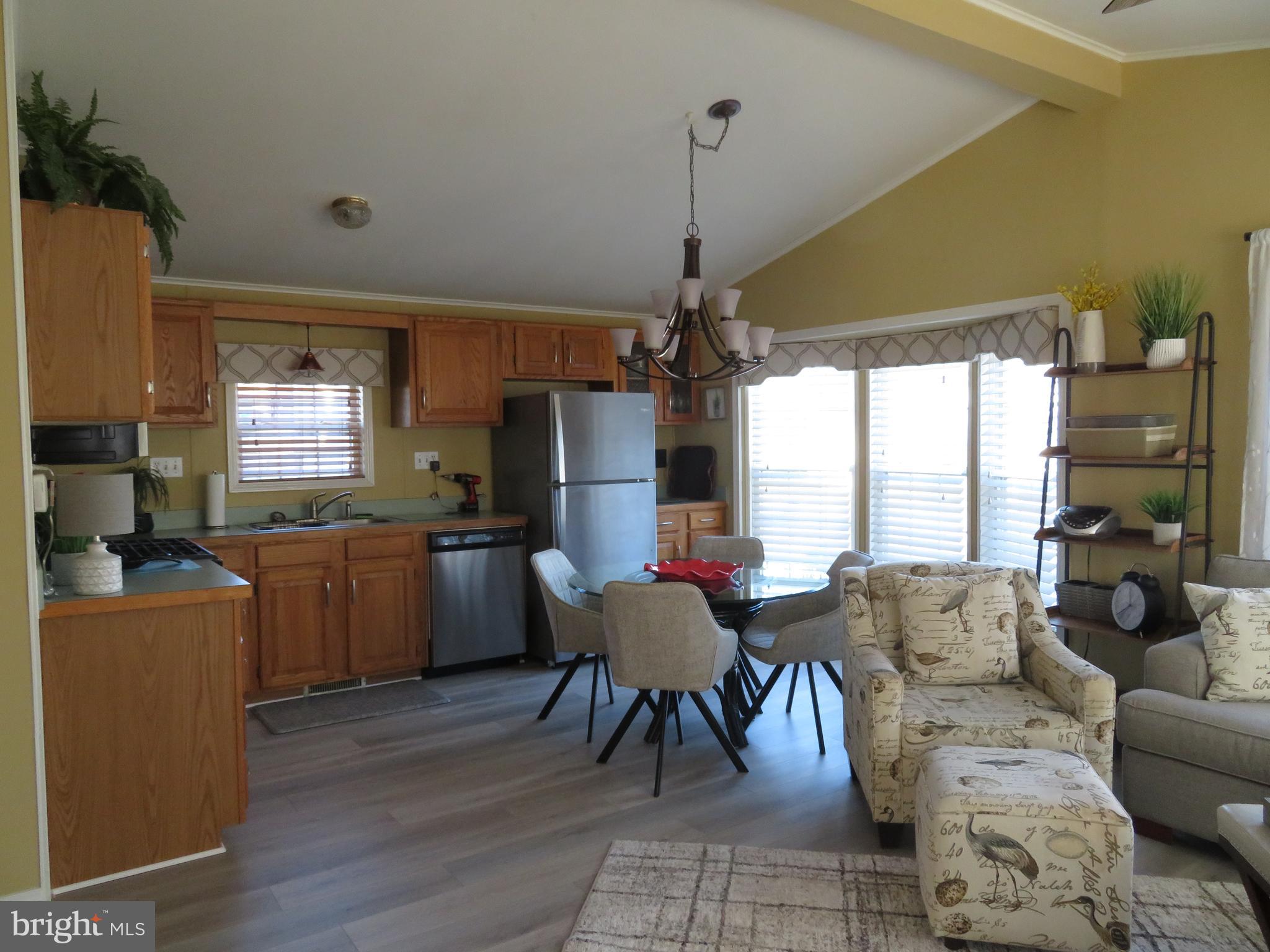 120 Skipjack Circle Berlin, MD 21811 - Photo 21 of 91 a living room with furniture and a flat screen tv