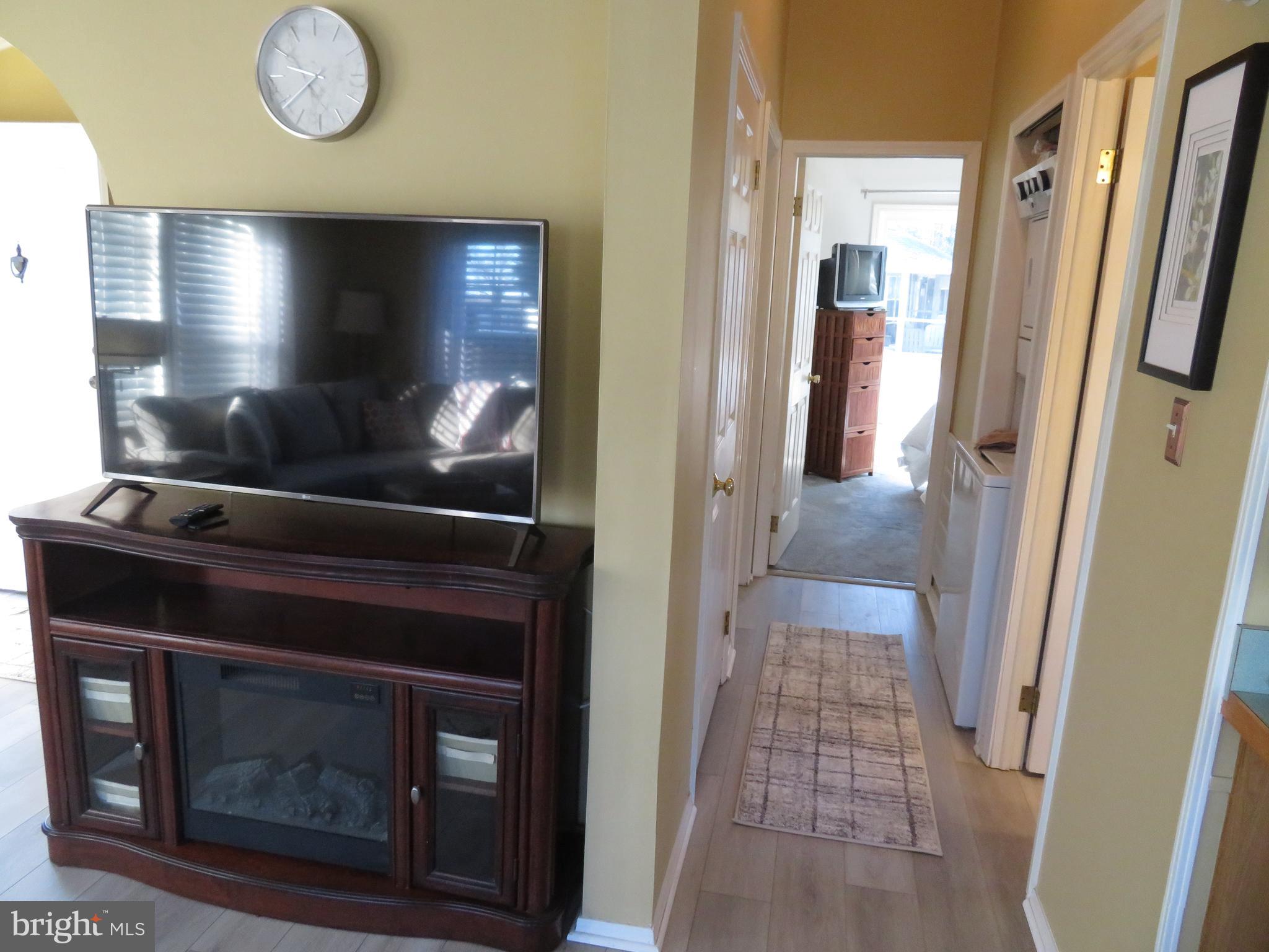 120 Skipjack Circle Berlin, MD 21811 - Photo 24 of 91 a view of a hallway with wooden floor and staircase