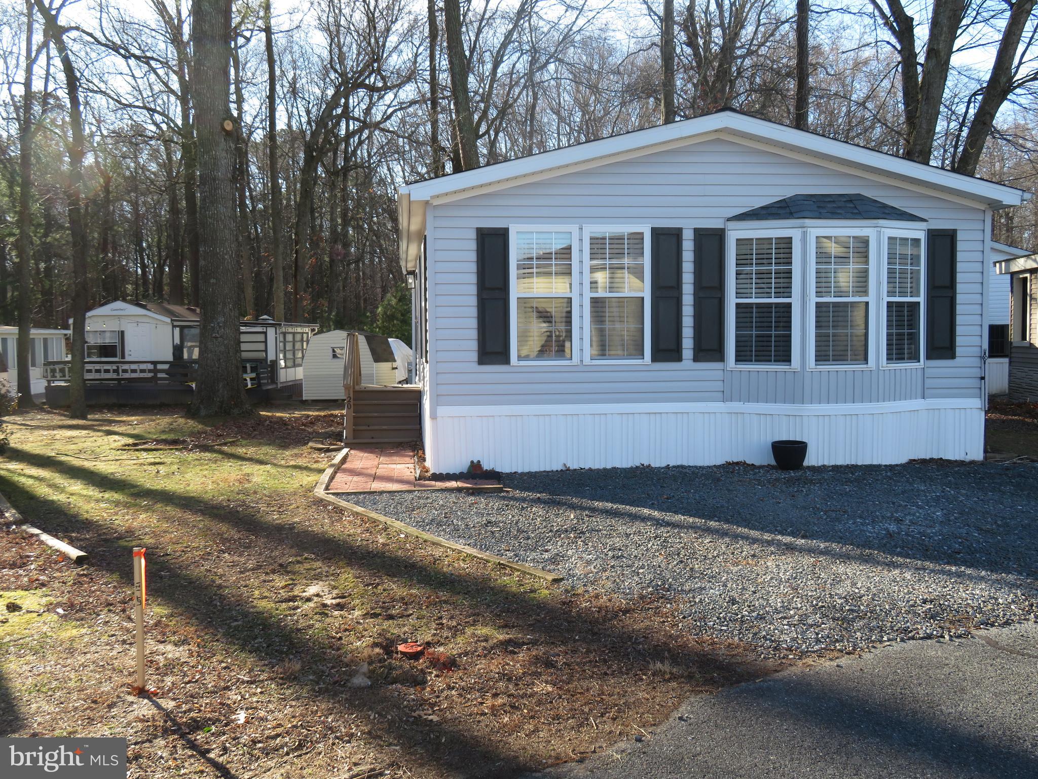 120 Skipjack Circle Berlin, MD 21811 - Photo 3 of 91 a front view of a house with a yard