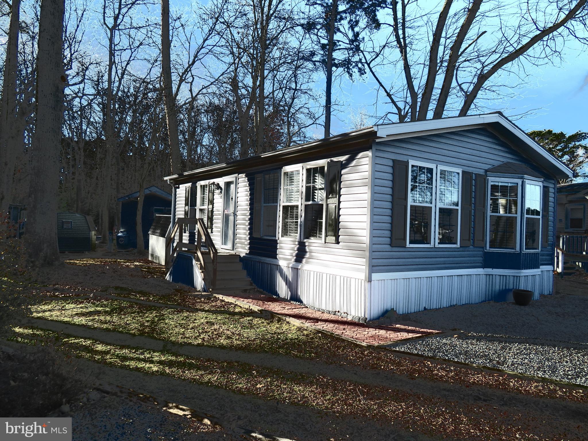 120 Skipjack Circle Berlin, MD 21811 - Photo 4 of 91 a front view of a house with a yard