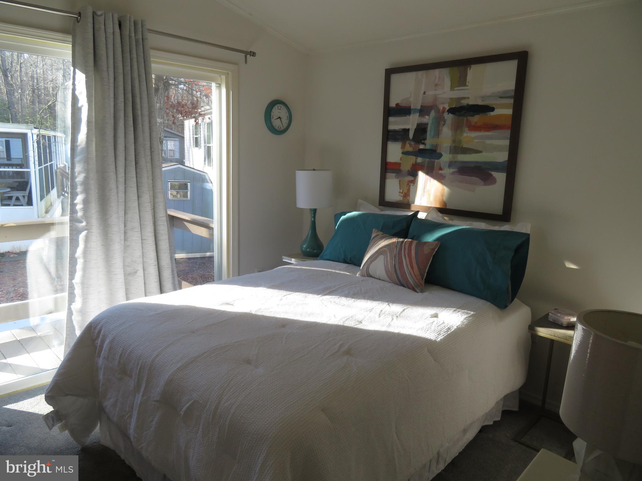 120 Skipjack Circle Berlin, MD 21811 - Photo 43 of 91 a bedroom with a bed and window