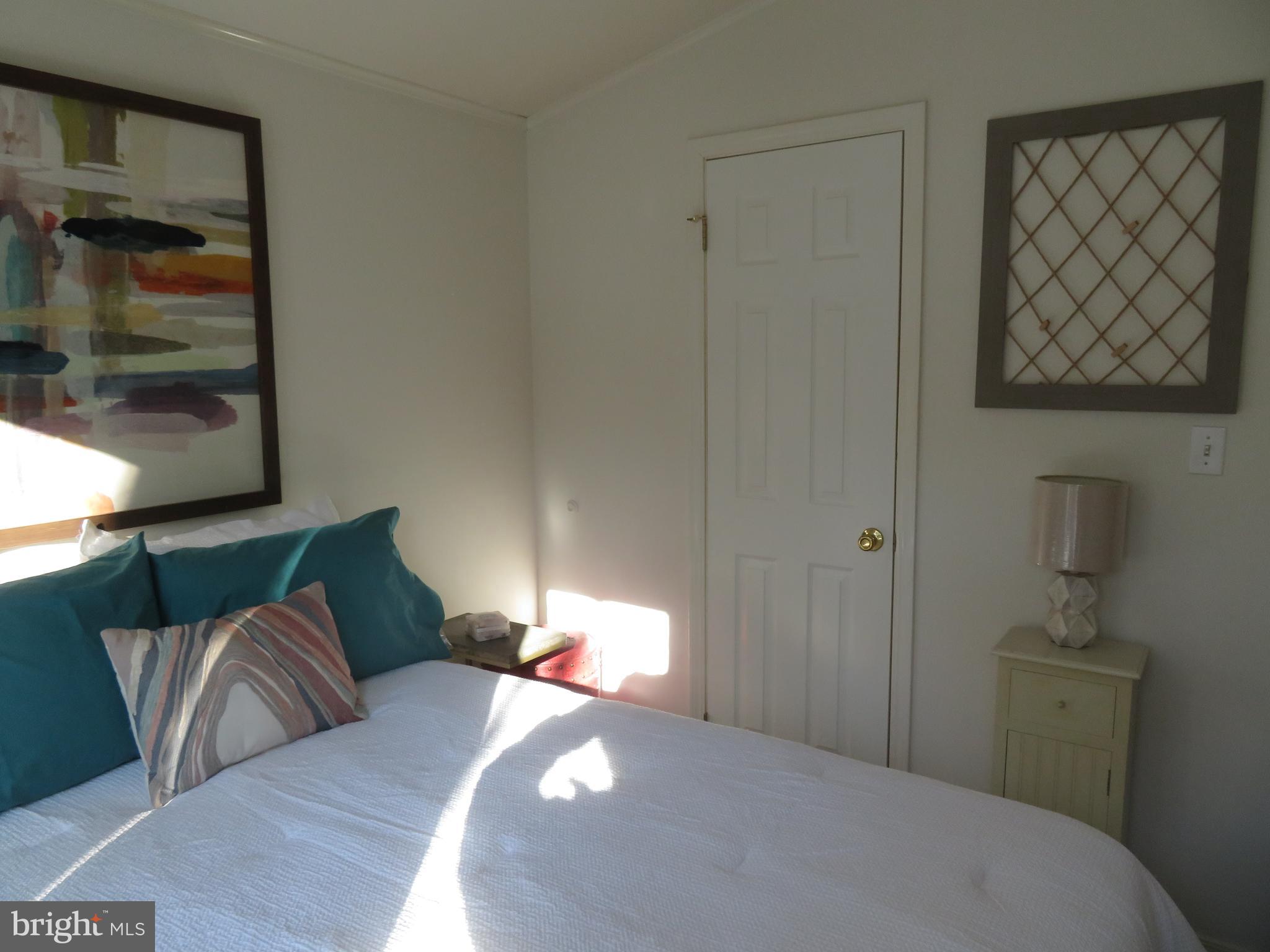 120 Skipjack Circle Berlin, MD 21811 - Photo 47 of 91 a bedroom with a bed and window