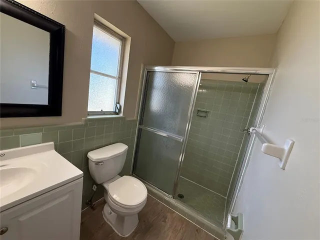 a bathroom with a toilet and a sink