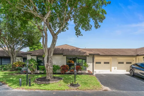 a view of a house with a garden