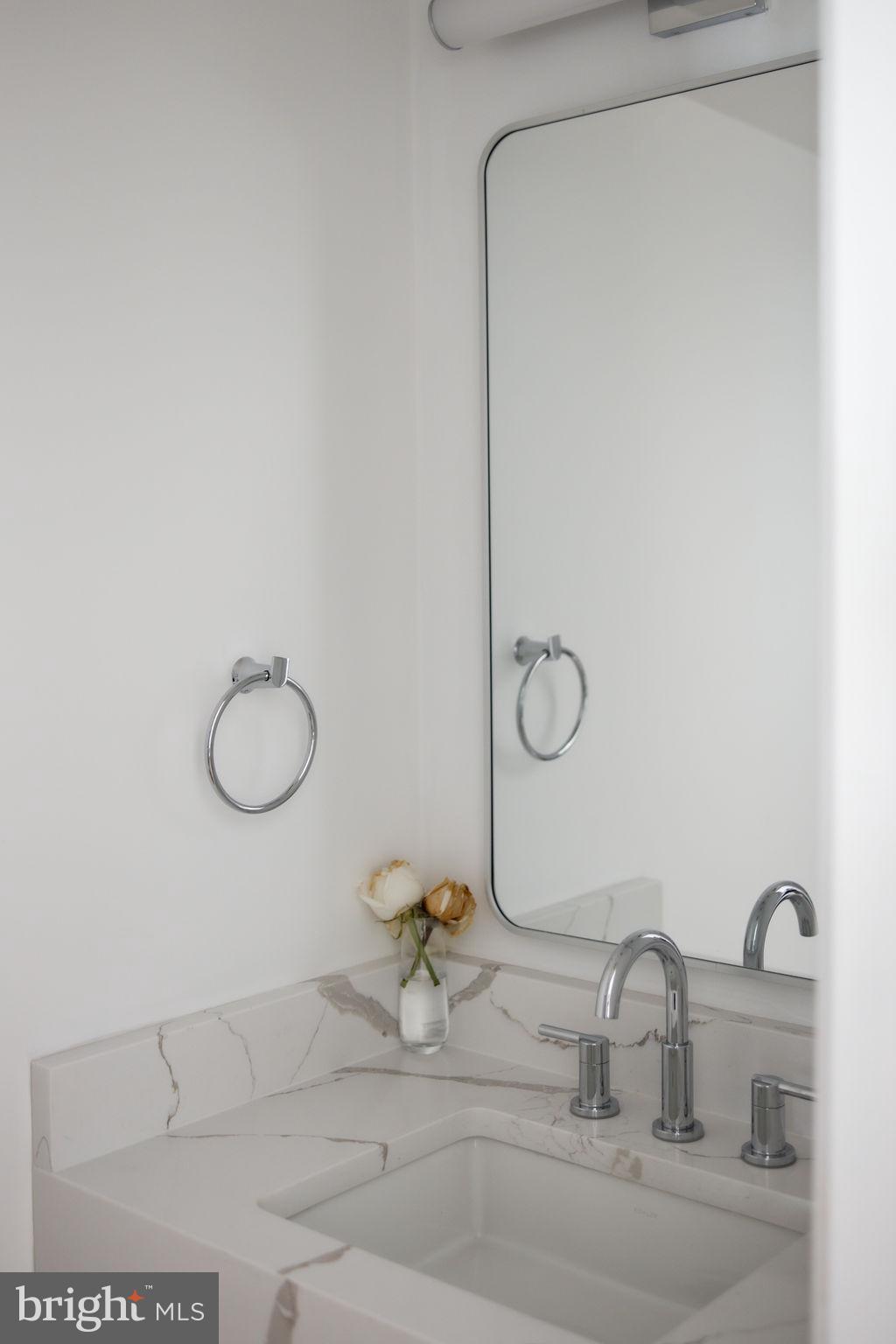1200 Eton Court Northwest Washington, DC 20007 - Photo 24 of 66 a bathroom with a mirror