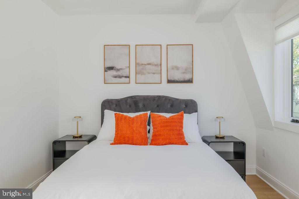 1200 Eton Court Northwest Washington, DC 20007 - Photo 61 of 66 a bedroom with a bed and night stand