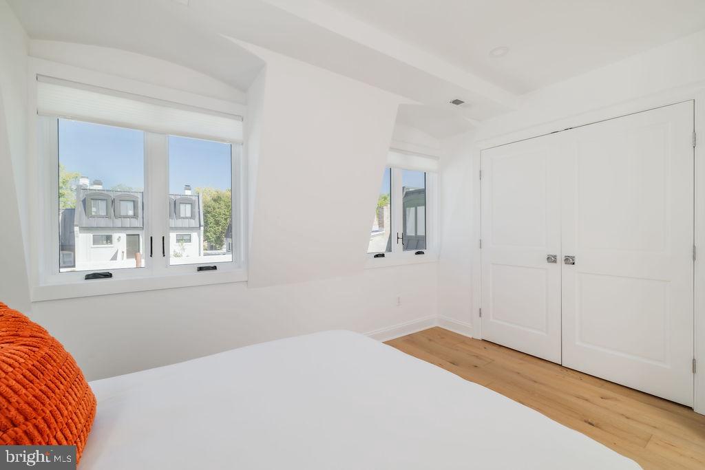 1200 Eton Court Northwest Washington, DC 20007 - Photo 62 of 66 a bedroom with a bed and a window