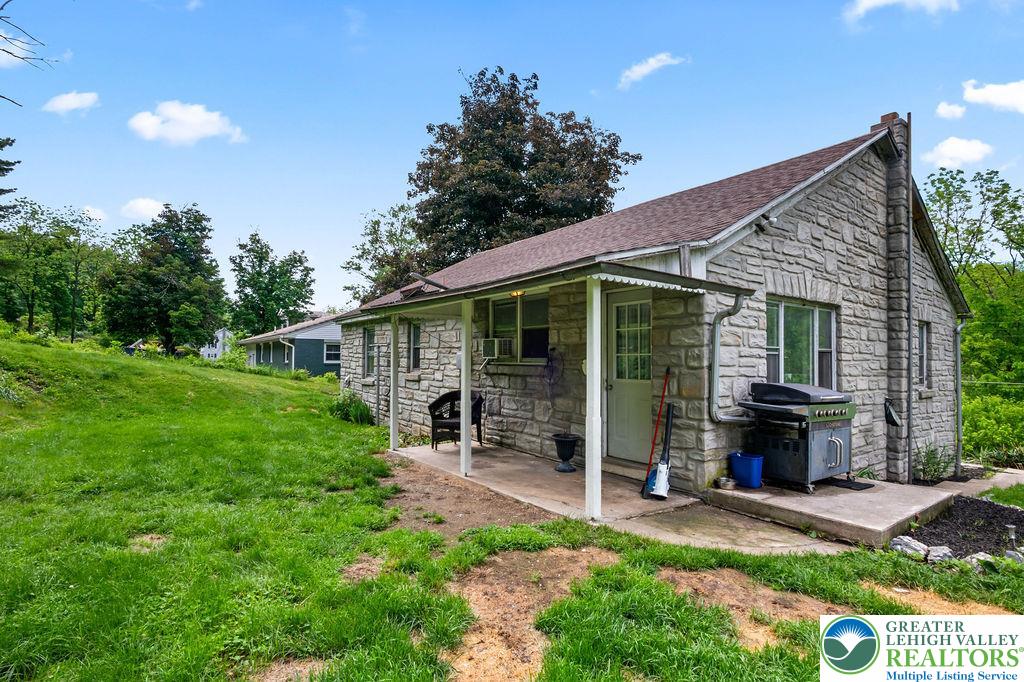 1644 Moselem Spring Road Hamburg, PA 19526 - Photo 20 of 24 a front view of a house with garden and porch