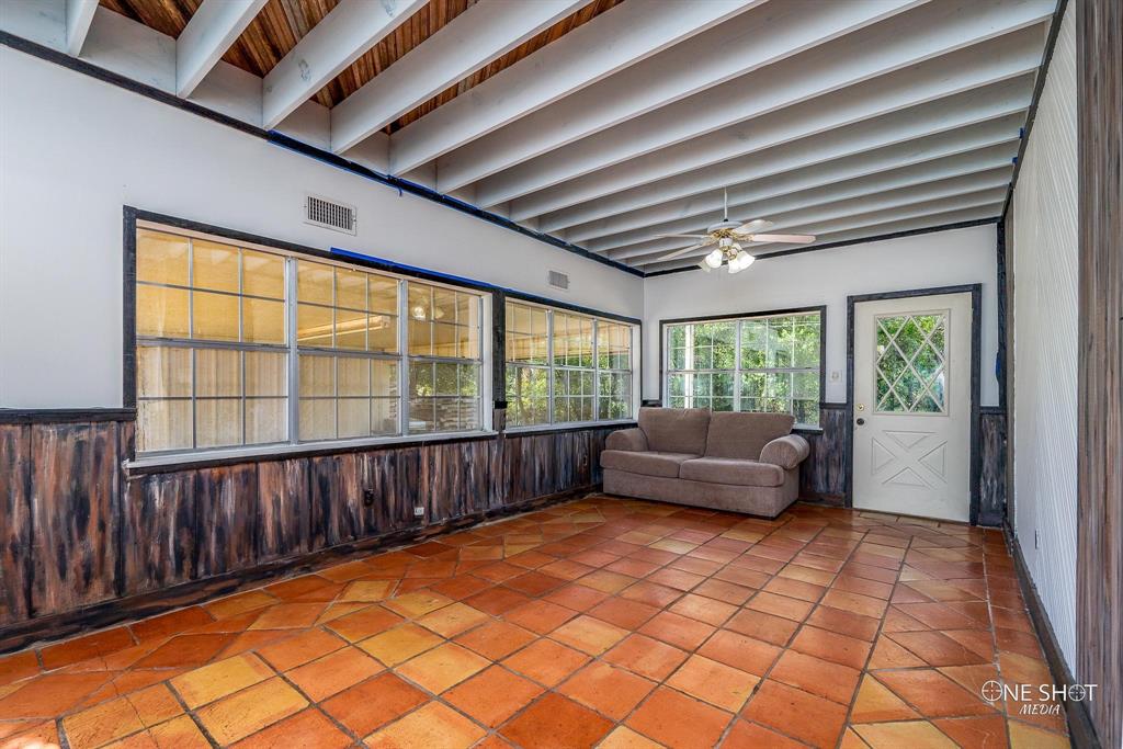 3741 Caldwell Road Abilene, TX 79601 - Photo 15 of 36 Unfurnished sunroom with ceiling fan and beam ceiling