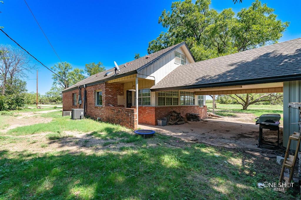 3741 Caldwell Road Abilene, TX 79601 - Photo 33 of 36 View of side of property featuring cooling unit and a carport
