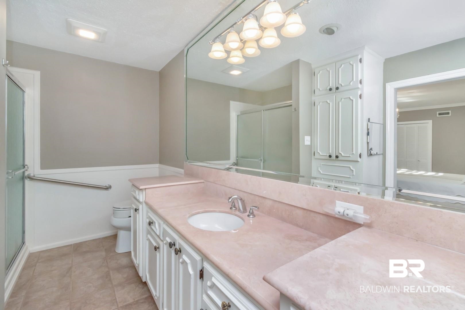 302 Springwood Drive East Mobile, AL 36608 - Photo 22 of 35 Bathroom with tile patterned flooring, vanity, toilet, and a shower with shower door