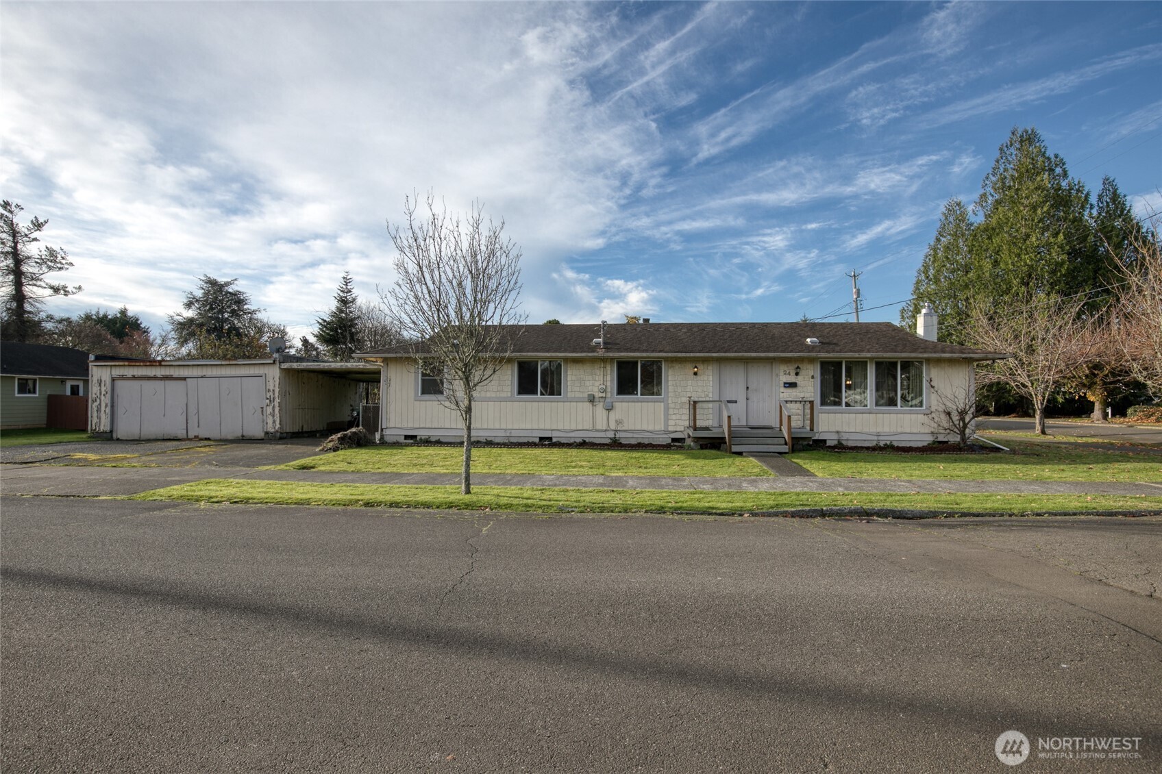 a view of house with outdoor space and front view of house
