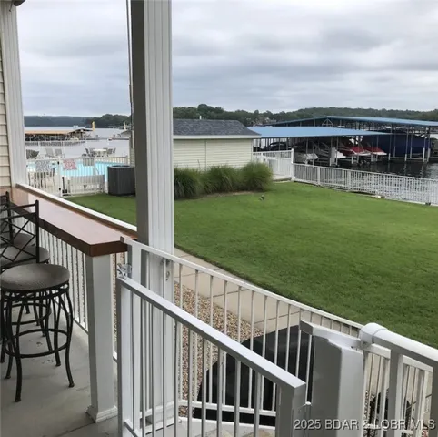 $359,900 | 216 Lakeview Resort Boulevard, Unit 1E, Sunrise Beach, MO 65079