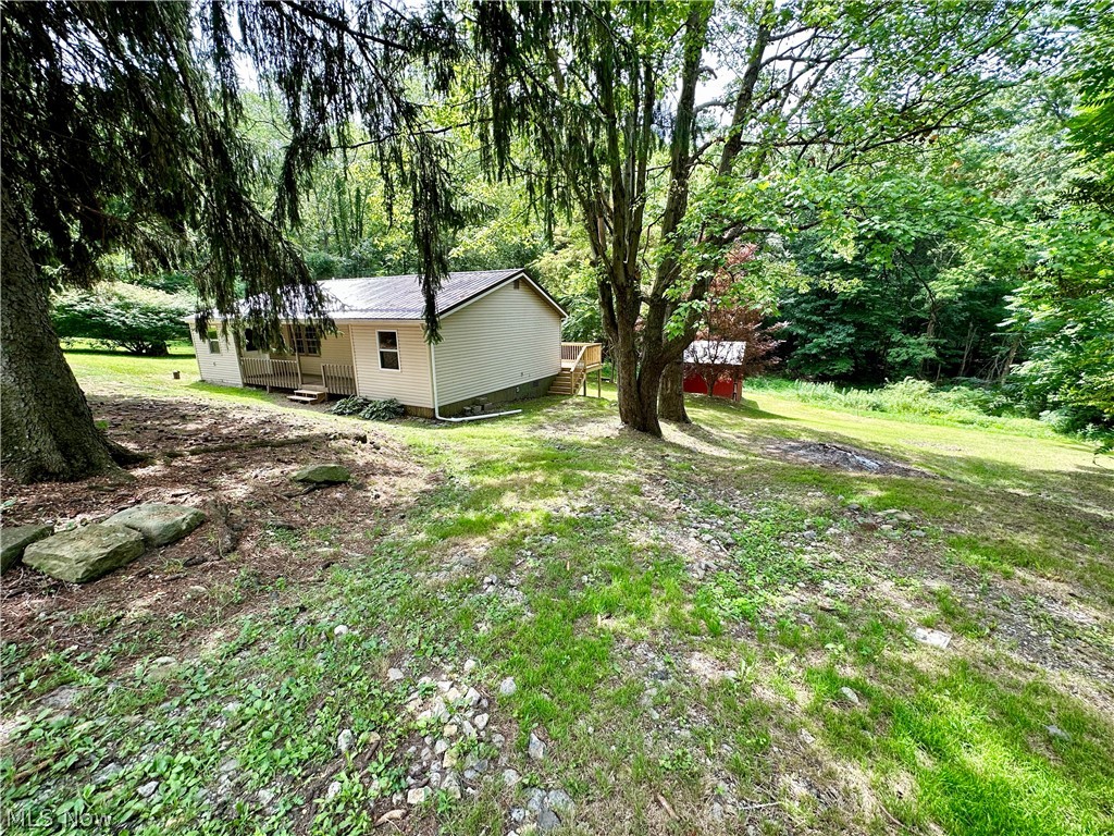 48963 Bloomfield Road East Liverpool, OH 43920 - Photo 3 of 25 View of yard with a shed