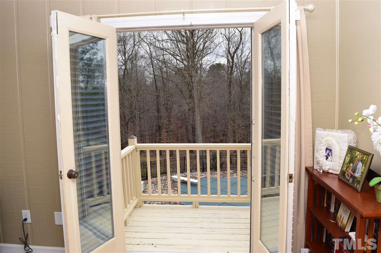 1987 Shotwell Road Clayton, NC 27520 - Photo 15 of 25 Overlooks backyard and pool area