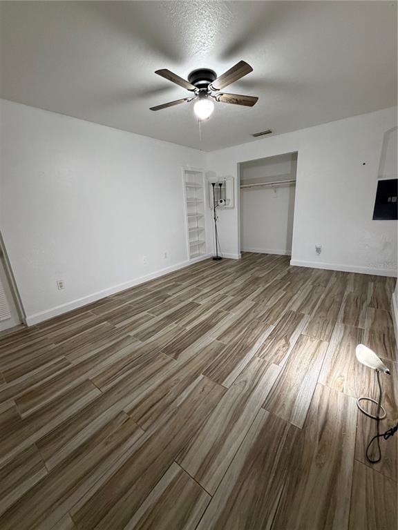 101 Gardenia Road Kissimmee, FL 34743 - Photo 15 of 24 wooden floor in an empty room