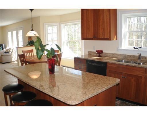 33 Quail Run Kennebunk, ME 04043 - Photo 8 of 25 Kitchen. Kitchen island looking into...