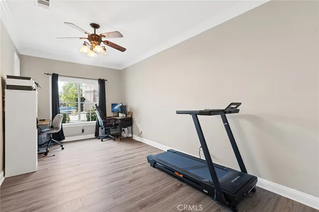 a bathroom with a toilet a sink and a mirror
