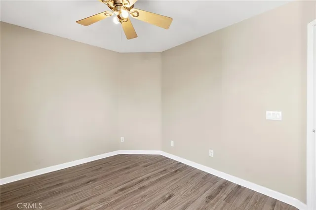 a bathroom with a sink toilet and mirror