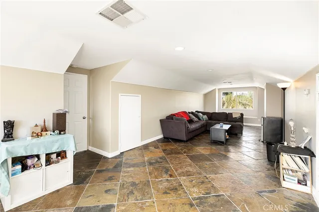 a backyard of a house with seating space