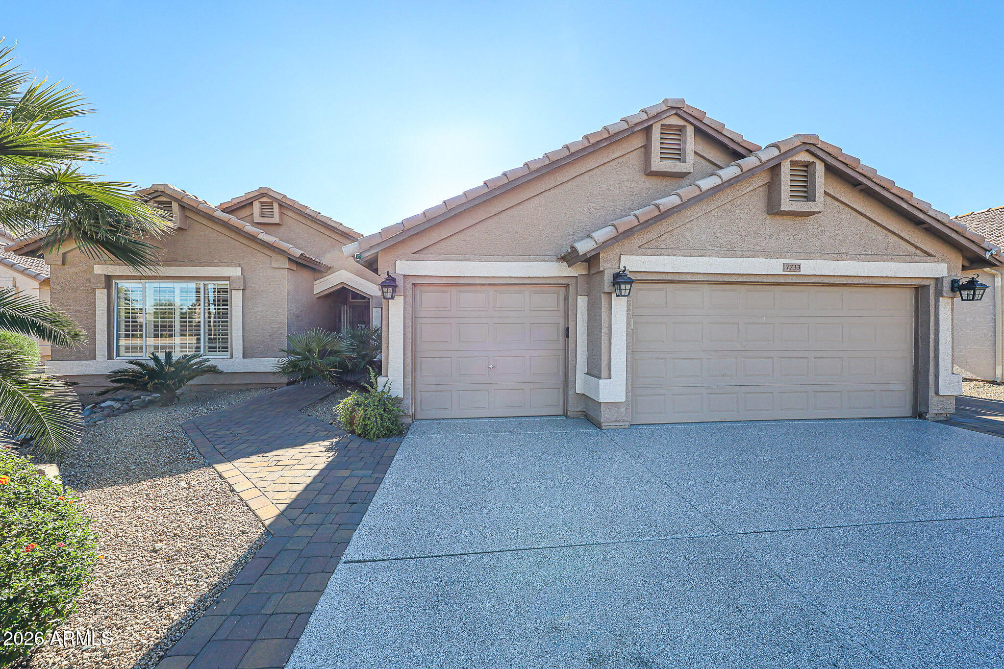 7733 West Rue De Lamour Peoria, AZ 85381 - Photo 1 of 62 Frontv1