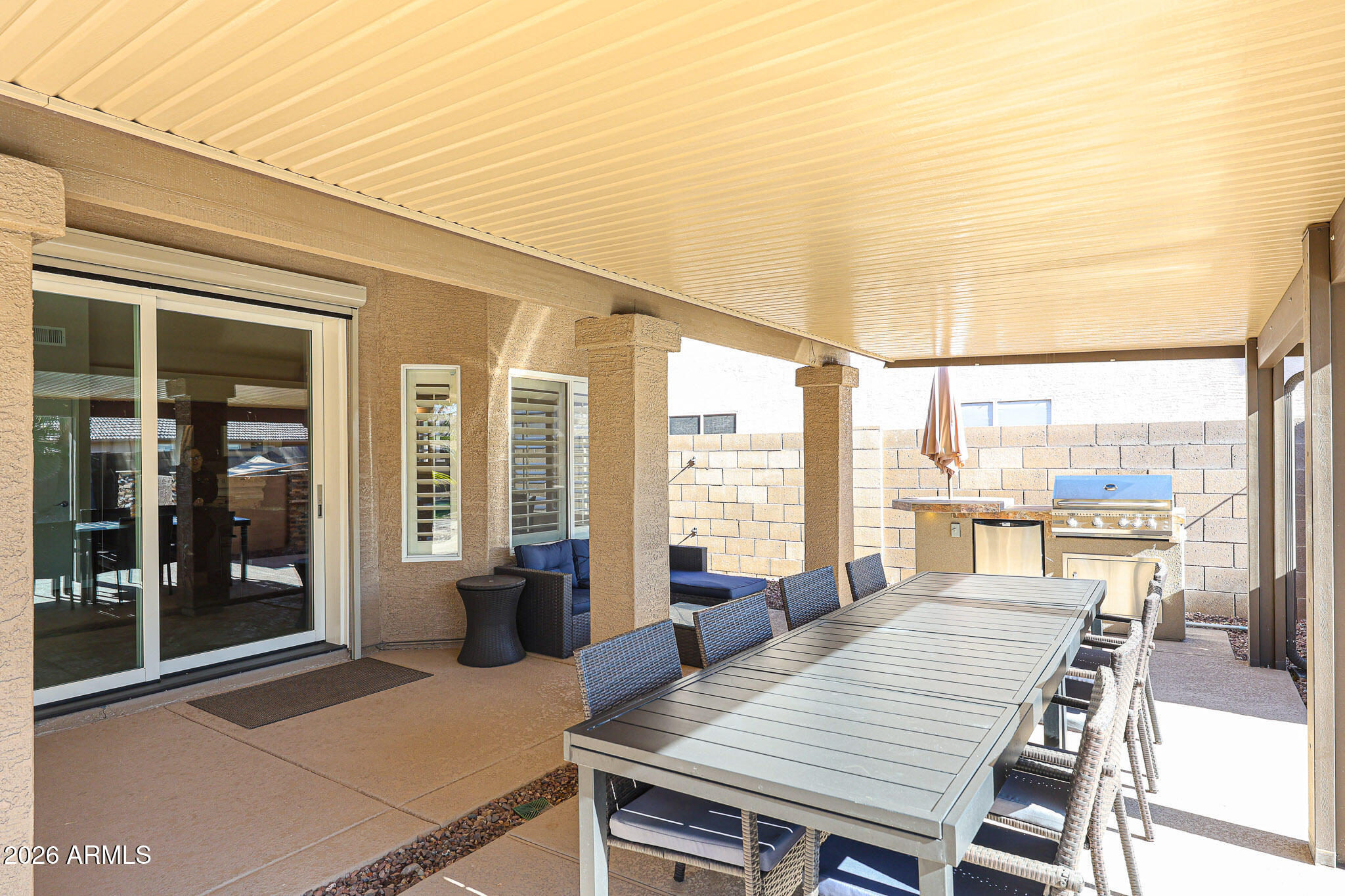 7733 West Rue De Lamour Peoria, AZ 85381 - Photo 40 of 62 a outdoor space with furniture