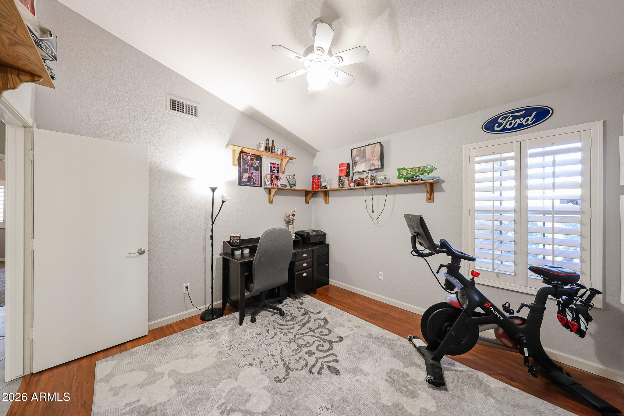 7733 West Rue De Lamour Peoria, AZ 85381 - Photo 53 of 62 a view of a workspace with furniture and a window
