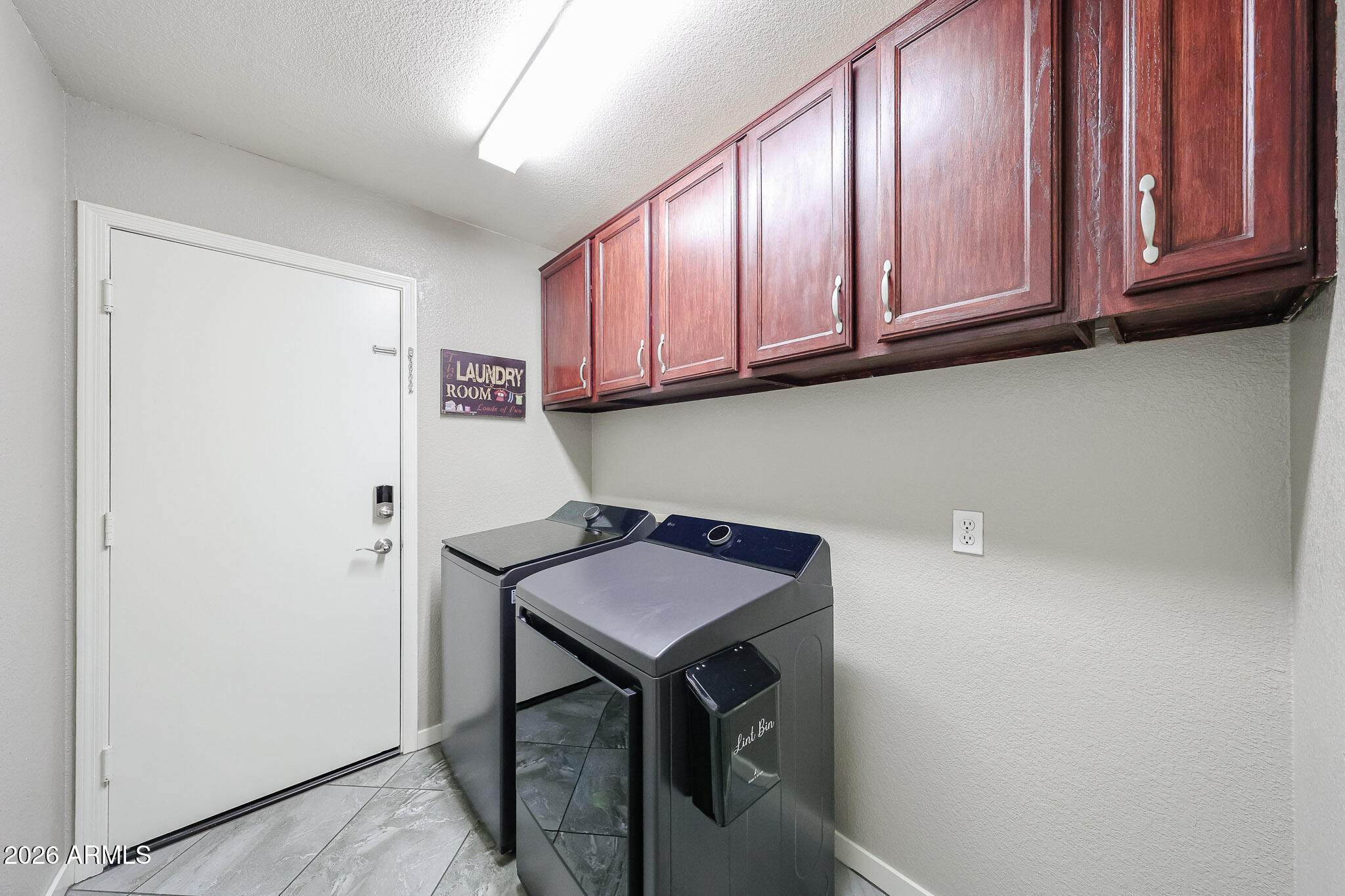 7733 West Rue De Lamour Peoria, AZ 85381 - Photo 60 of 62 a room with storage and utility