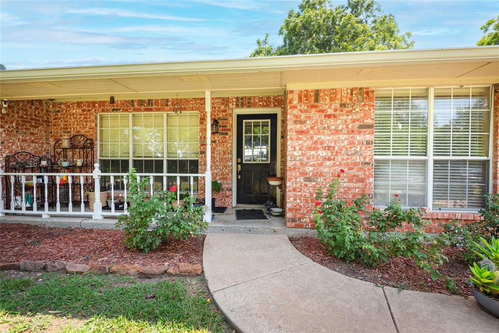 12097 Kyle Lane Blue Ridge, TX 75424 - Photo 12 of 13 a view of a entrance with a house
