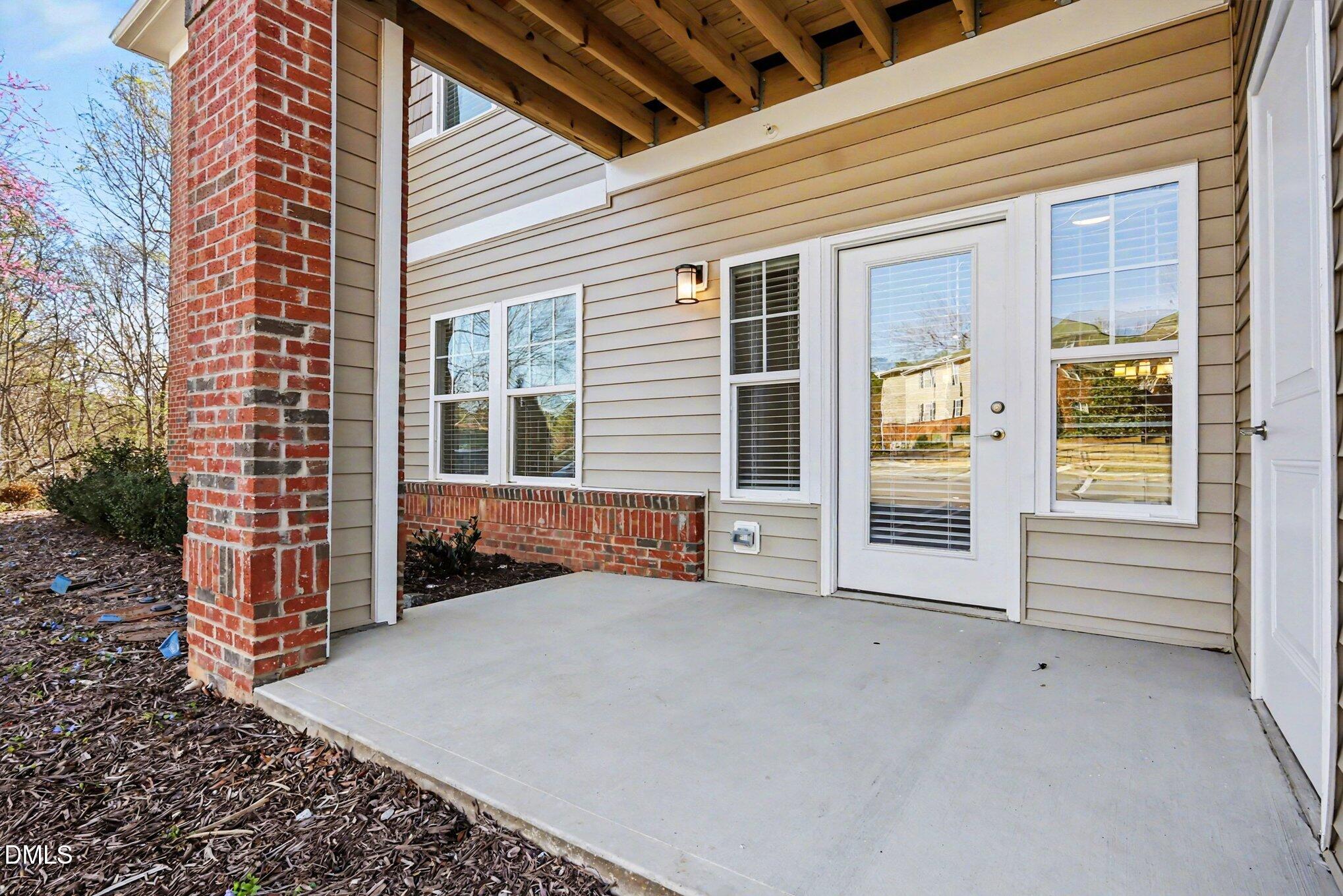 611 Weather Ridge Lane, Unit 25 Cary, NC 27513 - Photo 29 of 35 Covererd Patio