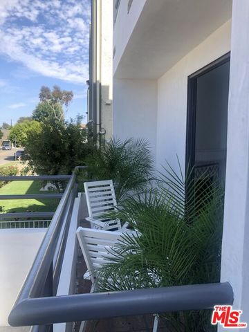 a view of swimming pool from a balcony