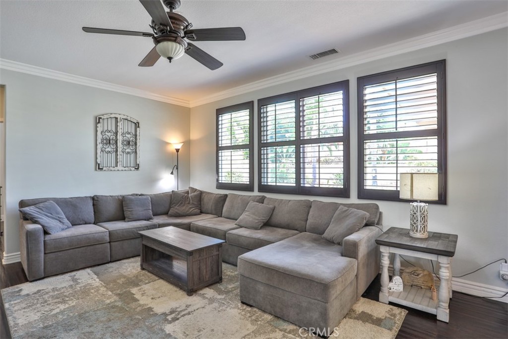 3250 Quartz Circle Corona, CA 92882 - Photo 23 of 68 a living room with furniture and a large window