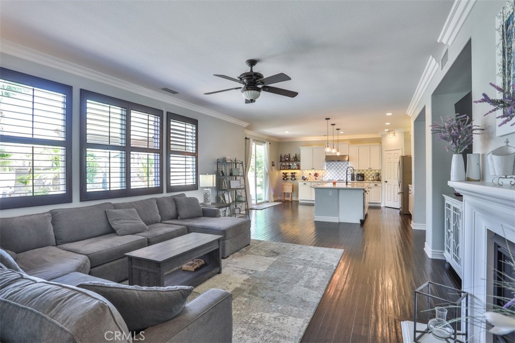 3250 Quartz Circle Corona, CA 92882 - Photo 25 of 68 a living room with furniture and a large window