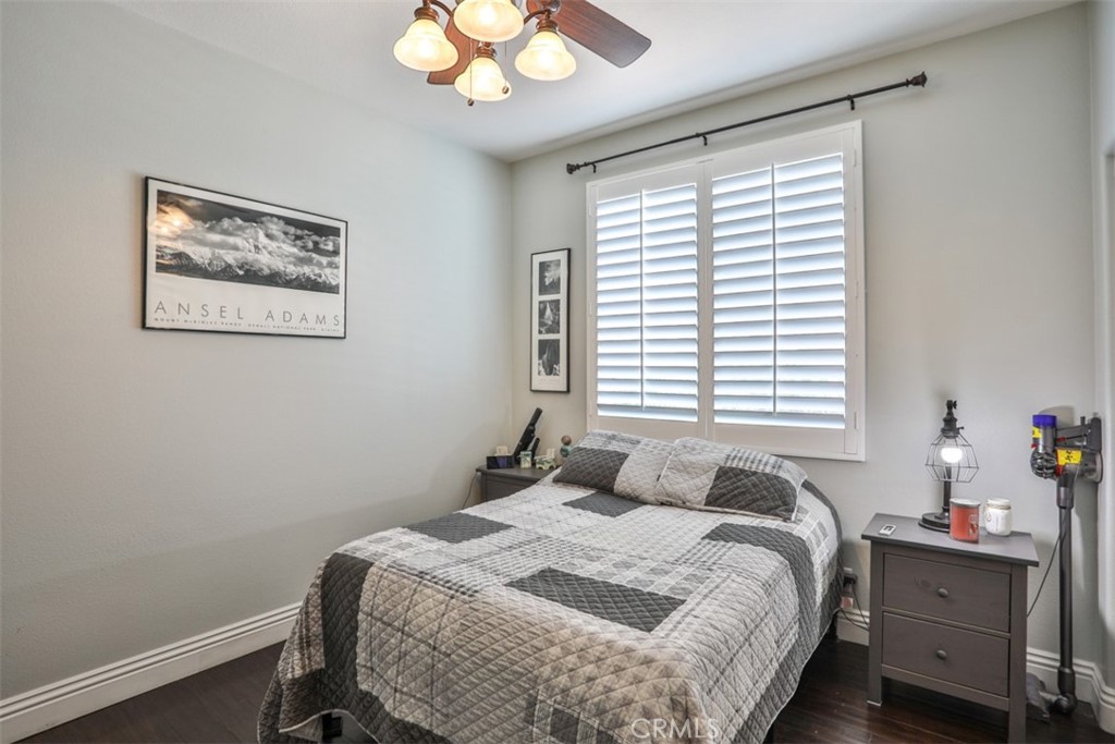 3250 Quartz Circle Corona, CA 92882 - Photo 26 of 68 a bedroom with a bed and a window
