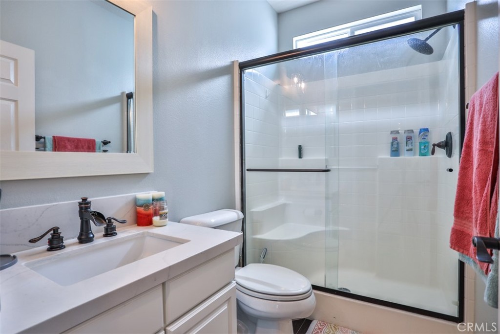 3250 Quartz Circle Corona, CA 92882 - Photo 28 of 68 a bathroom with a sink toilet and shower