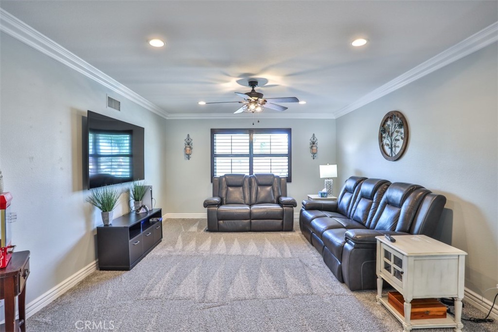 3250 Quartz Circle Corona, CA 92882 - Photo 29 of 68 a living room with furniture and a large window