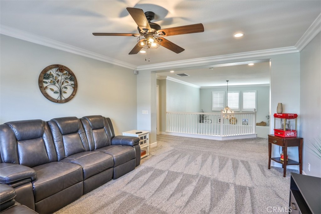 3250 Quartz Circle Corona, CA 92882 - Photo 30 of 68 a living room with furniture and a table