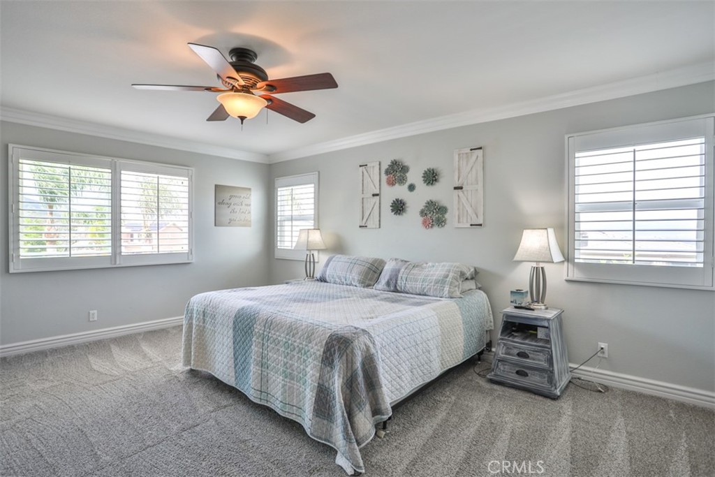 3250 Quartz Circle Corona, CA 92882 - Photo 32 of 68 a bedroom with a bed and a window