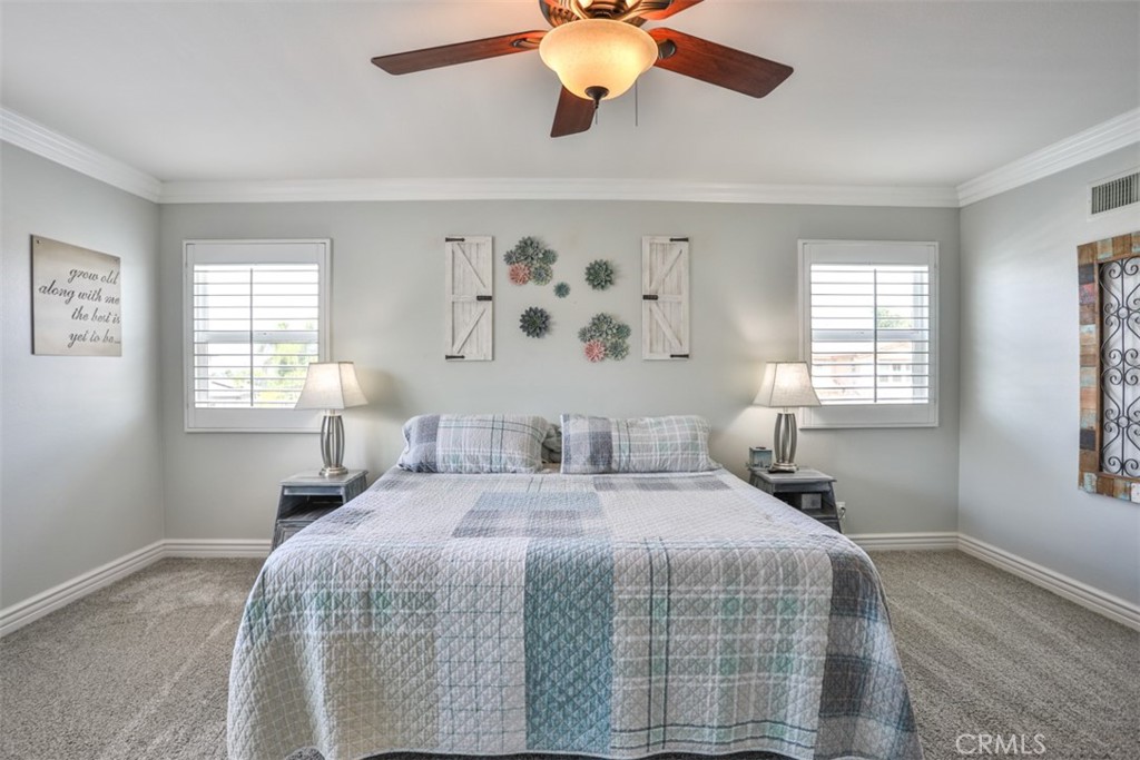 3250 Quartz Circle Corona, CA 92882 - Photo 33 of 68 a bedroom with a bed and a window