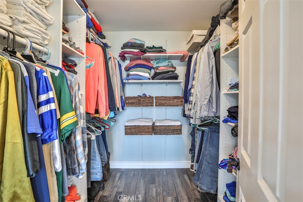 3250 Quartz Circle Corona, CA 92882 - Photo 38 of 68 a view of walk in closet with clothes