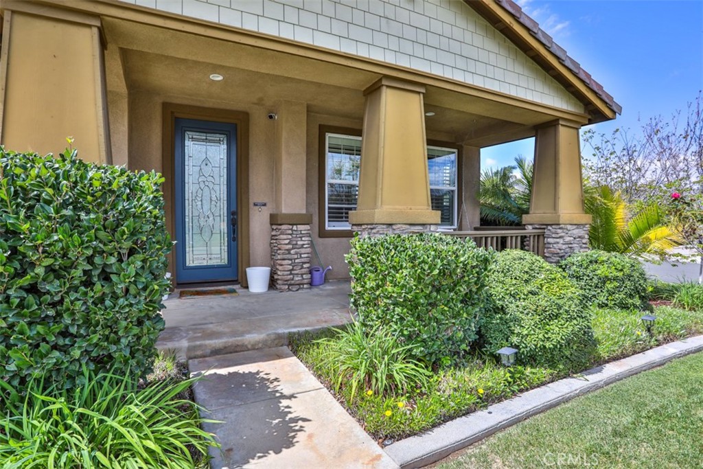 3250 Quartz Circle Corona, CA 92882 - Photo 4 of 68 a front view of a house with garden