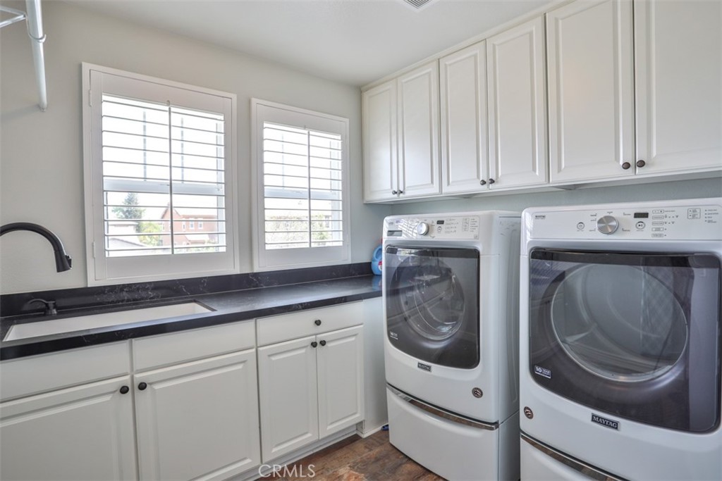 3250 Quartz Circle Corona, CA 92882 - Photo 45 of 68 a utility room with sink dryer and washer