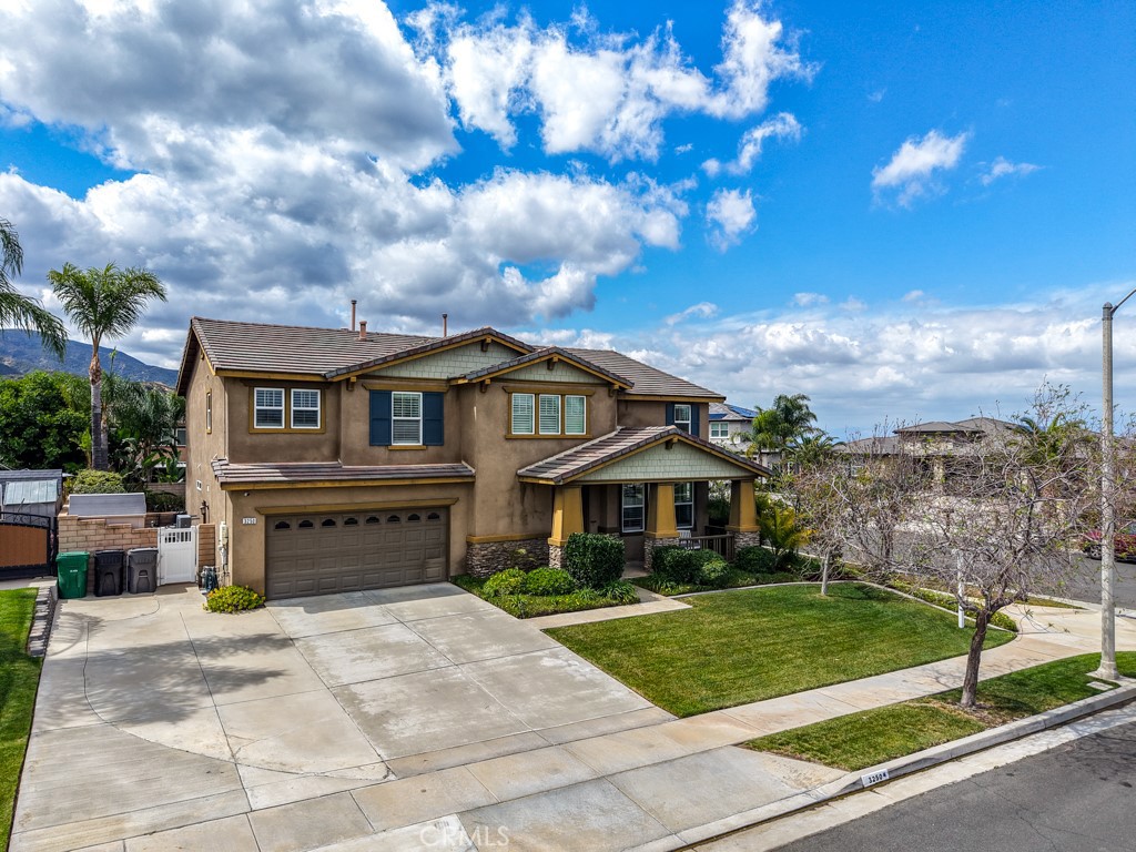 3250 Quartz Circle Corona, CA 92882 - Photo 59 of 68 a front view of a house with a yard