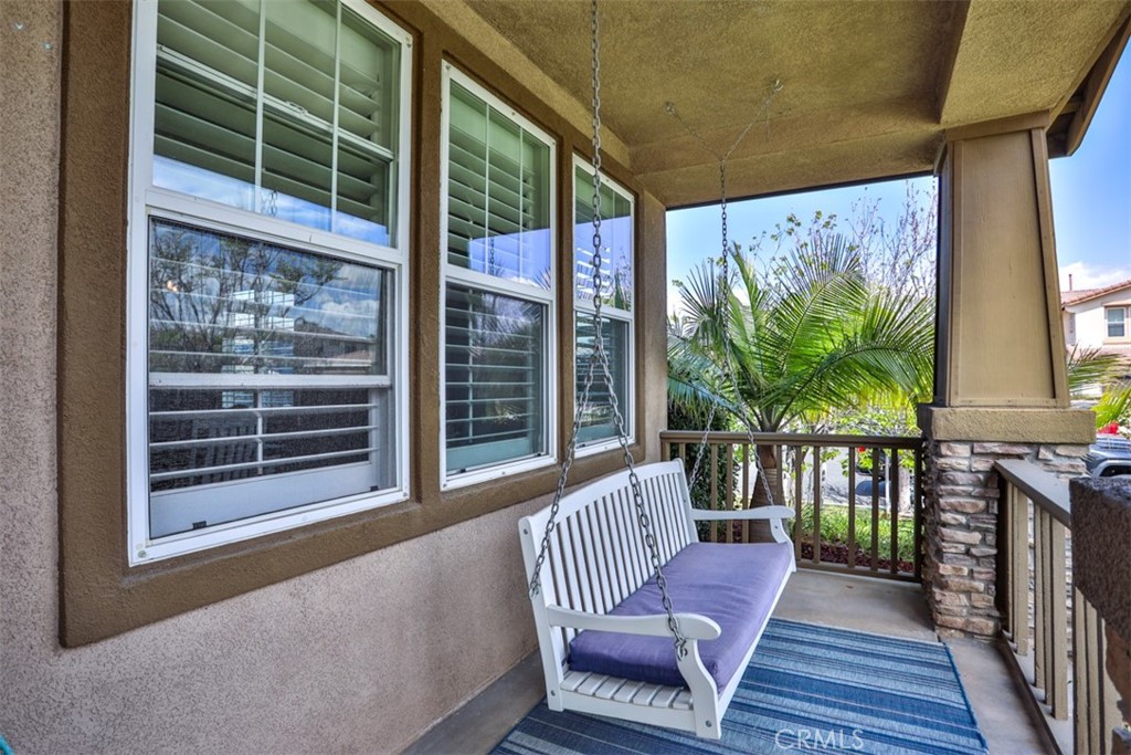3250 Quartz Circle Corona, CA 92882 - Photo 6 of 68 a view of a two chairs in the balcony